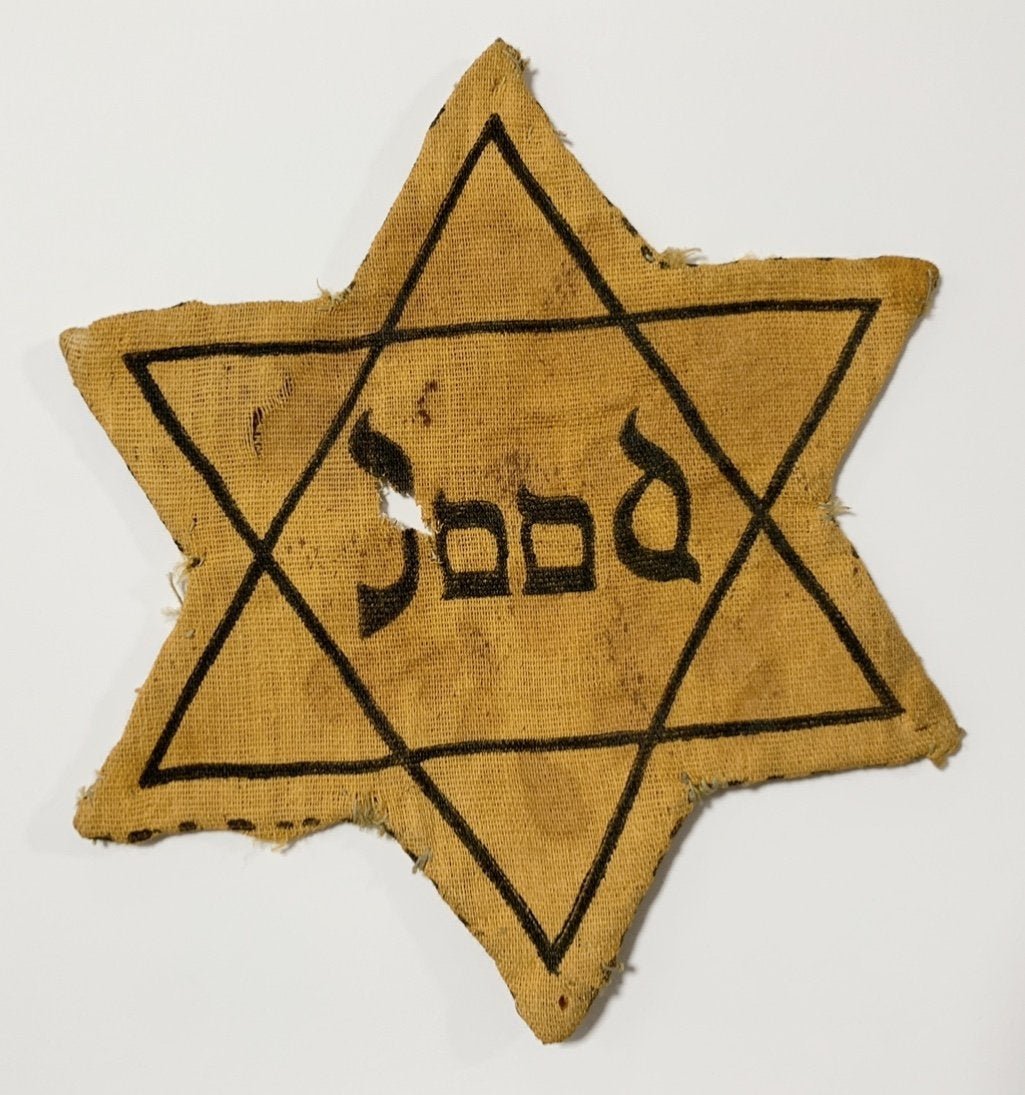 HOLOCAUST - JOOD CLOTH STAR OF DAVID IN DUTCH VERSION!: Holocaust - Used JOOD version cloth Star of David for Dutch Jews. This star was the one used to identify the Jews within the Netherlands during III Reich. It had the word JOOD written within a yellow