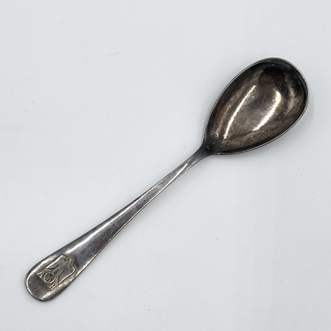 Adolf Hitler Informal Pattern Ice Cream Spoon: Hitler's Personal Informal Pattern Ice Cream Spoon - Manufactured by silver maker Bruckmann and measures 5.5 inches in length. It's in excellent condition. The lower part of the handle has a Political