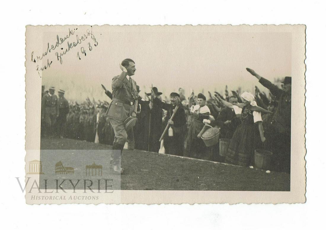 3 Reich - Adolf Hitler Bückeberg in 1933: Postcard size Adolf Hitler's private taken photo during his visit to the Erntedankfest in Bückeberg in 1933. We see him saluting the citizens.