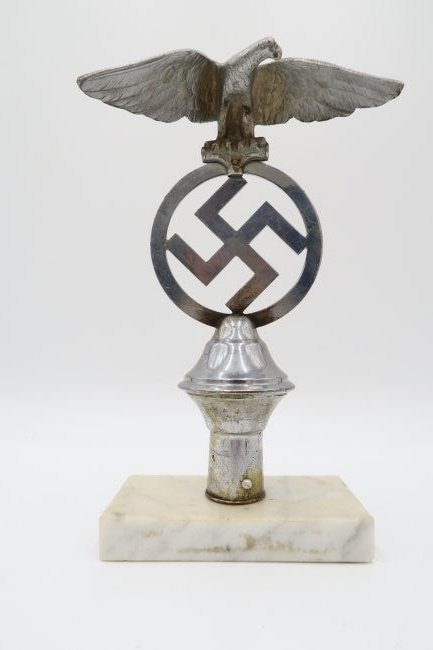 NSDAP Flag Pole Topper with Eagle: NSDAP Flag Pole Topper with Eagle and swastika. This topper was period modified in the 1930's or early 1940's with the addition of the eagle. The marble base is modern. Overall height is 24 cm.