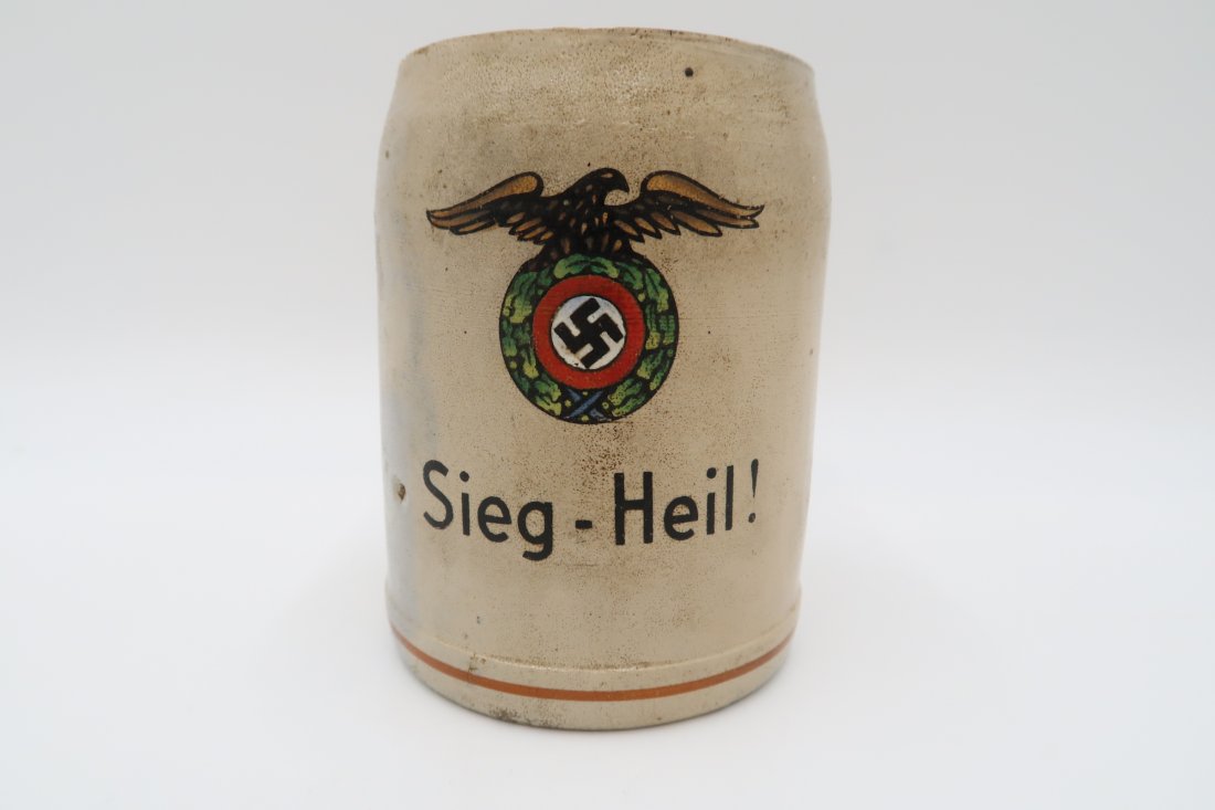 Third Reich \"Sieg Heil\" Stein Mug: Third Reich \"Sieg Heil\" Stein Mug. It has a painted on eagle with swastika. .5 L size. Small hairline crack but still as solid as can be.