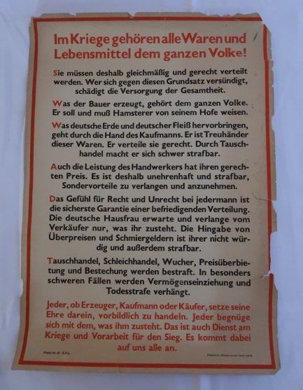 Poster "In War all Food and Items Belong tothe Country": Patriotic poster with guidelines issued to the citizens indicating that during the war all the goods and food belong to the country, as an effort of wartime so as to win.Poster size is 16.5 x 11.75 cm