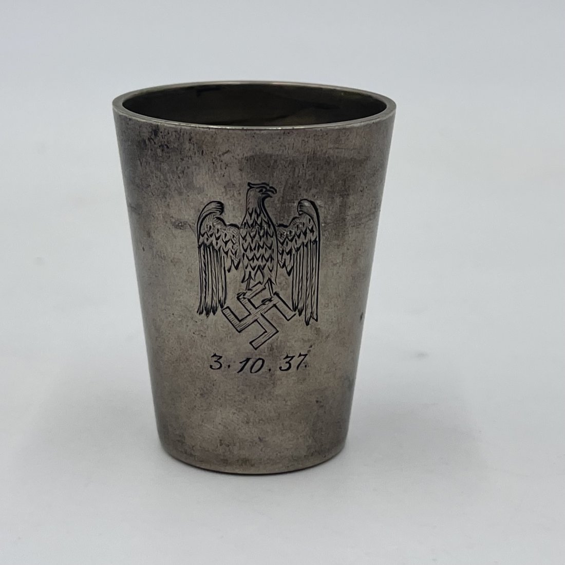 Nazi 835 Silver Shot Glass - 1937: Nazi 835 Silver Shot Glass dated 1937. The front has a national eagle with swastika with the date 3.10.37. The back reads "Heeres Abnahmekommando I Berlin Spandau Zitadelle. The bottom is maker marked