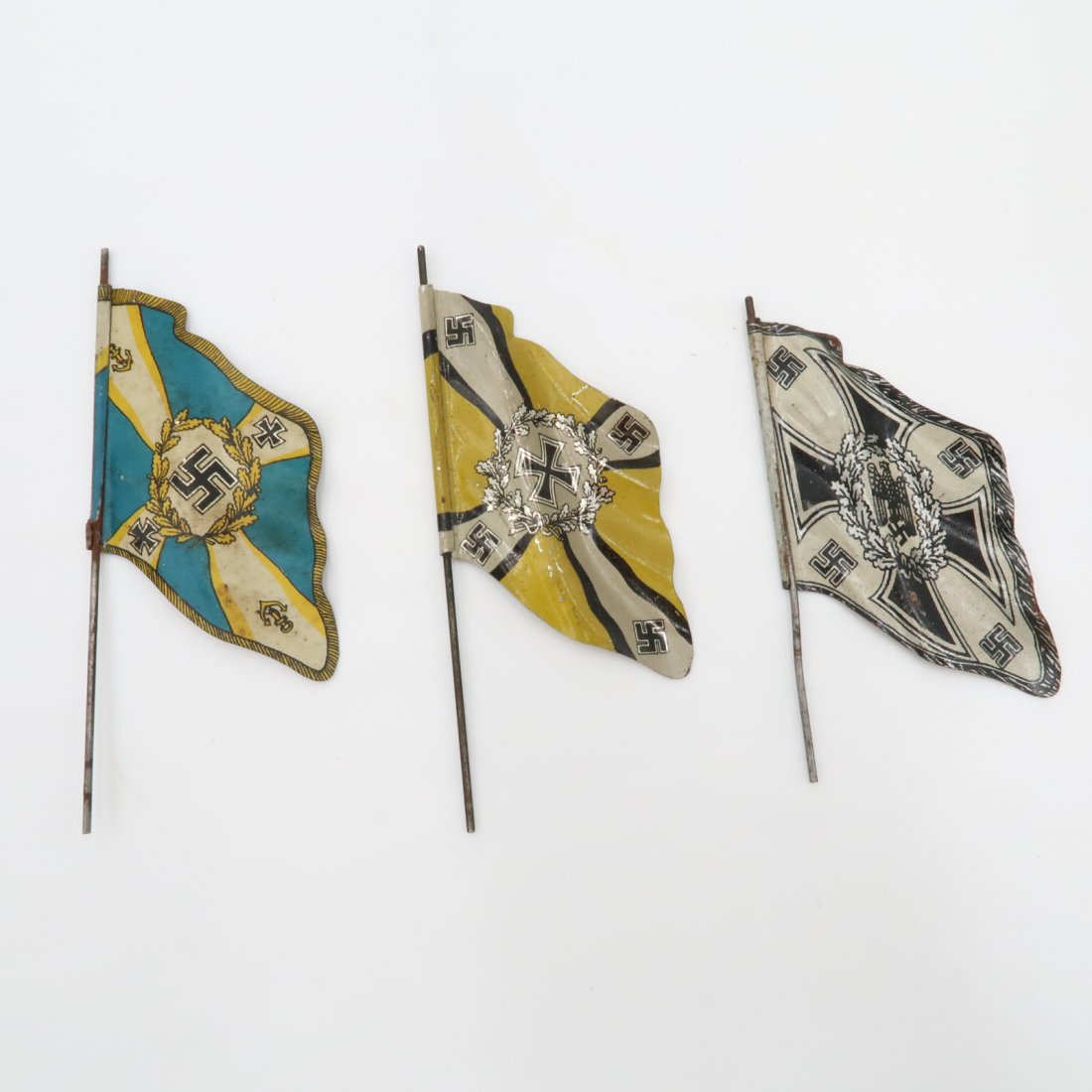 Nazi Tin Flags - Set of 3: Nazi Tin Flags - Set of 3. Two Heer flags and a Luftwaffe. Length of poles vary, around 34-4 inches each.