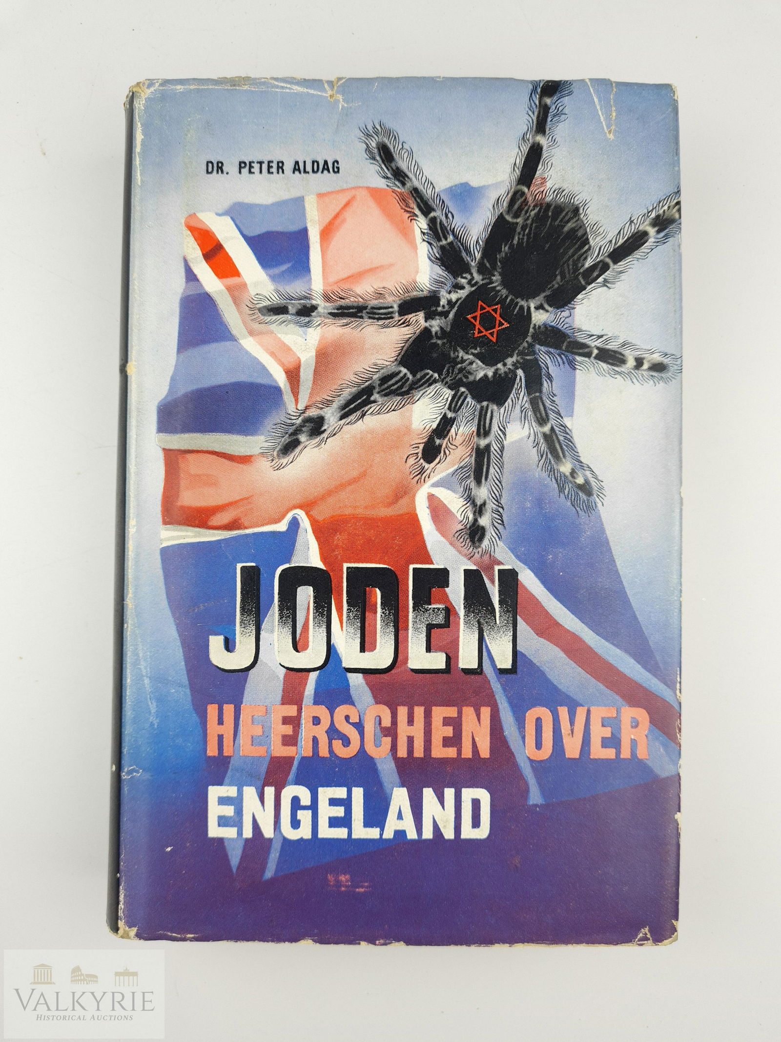 Dutch Anti-Semitic Book "Jews Rule England" 1943: Anti-Semitic Book written in Dutch and published in 1943 in Amsterdam "Joden heerschen over Engeland" (Jews Rule England). Book written by Dr. Peter Aldag. It comes with the rare original dust jacket.