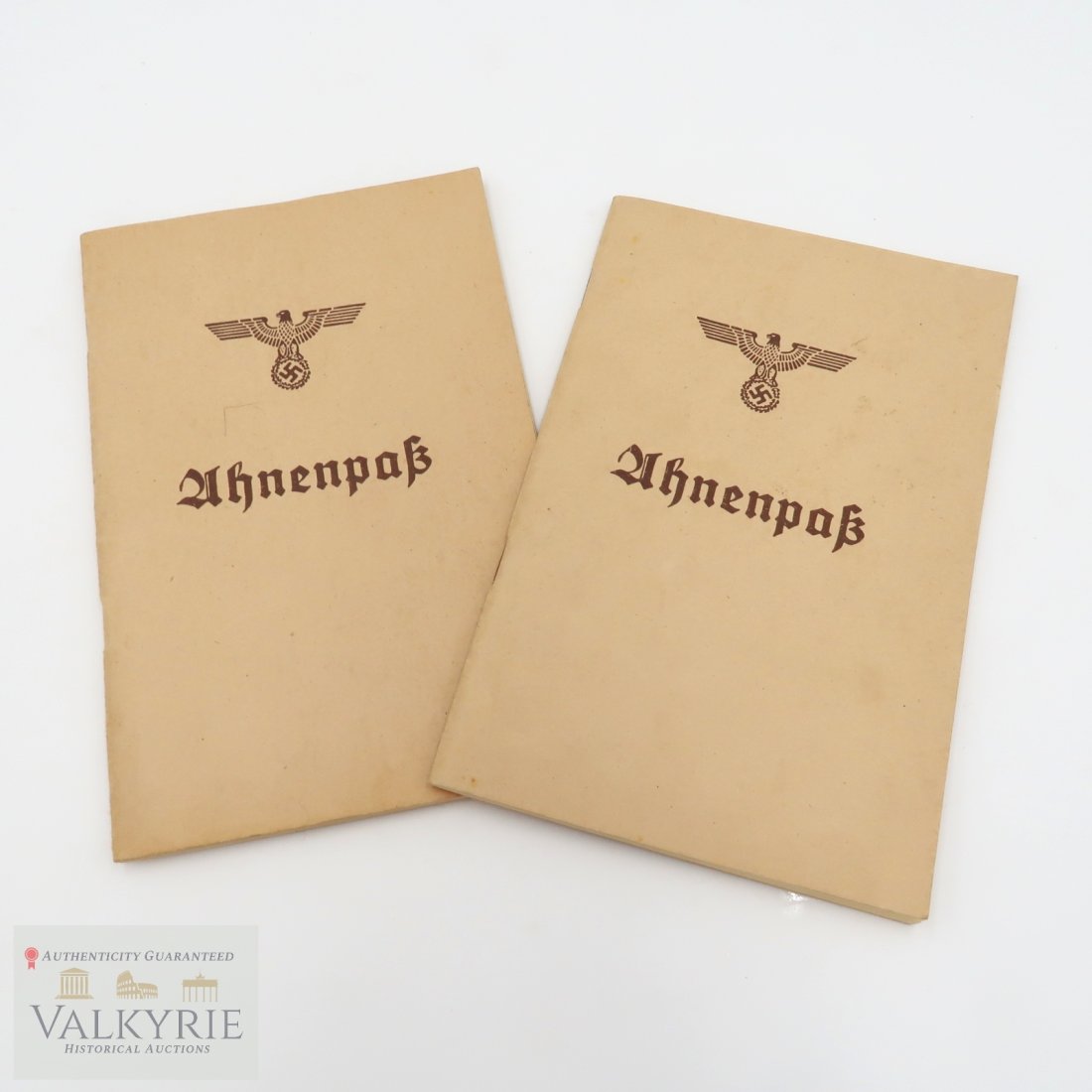 NAZI THIRD REICH 'AHNENPASS' (Set of 2): German 'ahnenpass', 32pp. 8vo., used by German citizens to record family lineage in order to prove his Aryan heritage.
