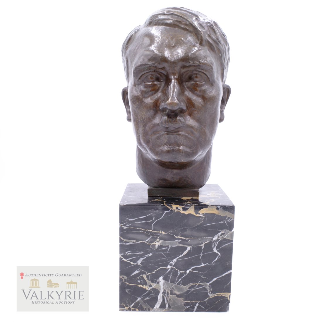 Adolf Hitler Lifesize Bust by H.M. Ley: Adolf Hitler Lifesize Bust by H.M. Ley with WMF foundry mark. This example is in excellent condition. The overall height is about 17 inches and the bronze is about 11 inches. Photo showing kepi on the