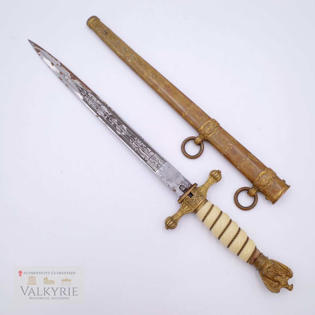 Nazi Kreigsmarine Dagger by Eickhorn: Nazi Kreigsmarine Dagger by Eickhorn. The condition is not great. The blade is stained (looks like rust but is completely smooth to the touch). The release button for the scabbard is missing. Scabbard