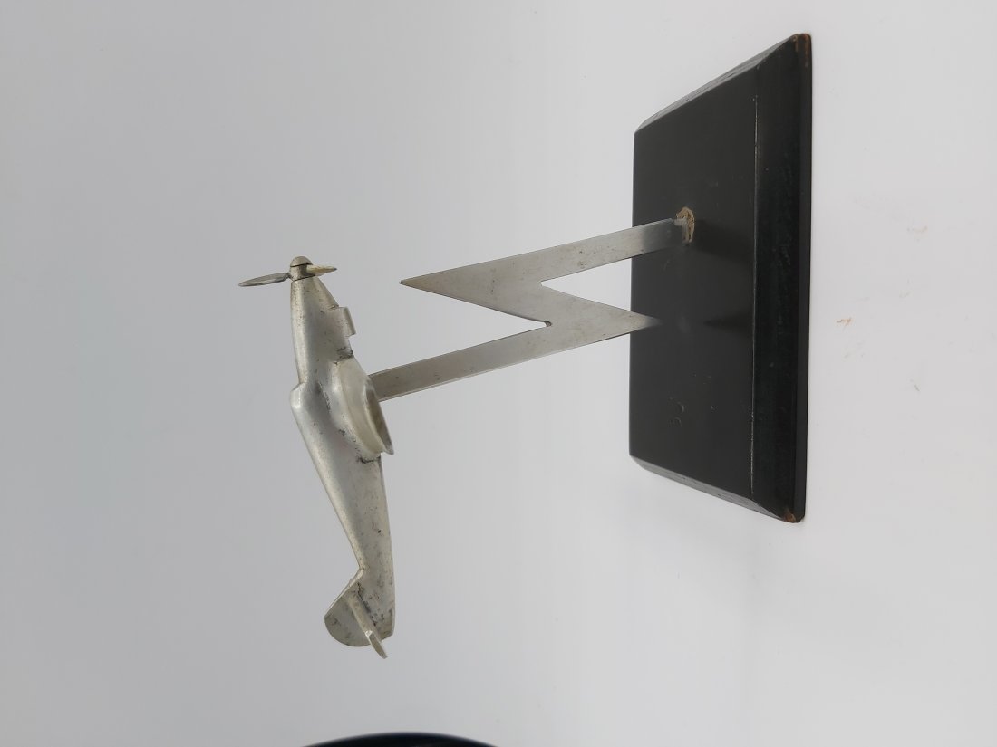 Aluminum plane, trench art German Messerschmidt?: Aluminum plane, trench art German Messerschmidt?A hand-made fighter plane - Messerschmidt or other. A characteristic lightning striking the ground from the plane - a frequent motif on German airline b