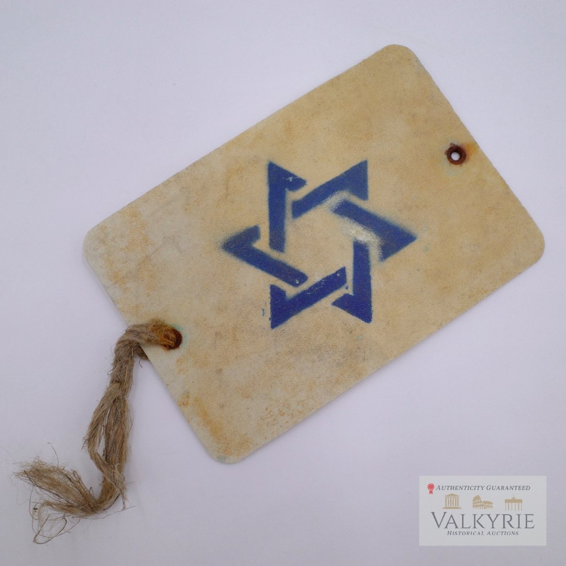 Star of David Armband from Warsaw Ghetto - Ultra Rare: An extremely rare compulsory Star of David armband which were required by law and worn only in the Warsaw Ghetto in Poland. Nearly all of the Jews that lived here ended up in an extermination camp and