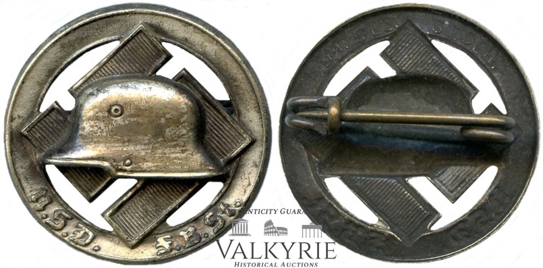 Germany Third Reich Badge (1940) NSD FB St.: Germany Third Reich Badge (1940) NSD FB St. Averse: Bears a raised helmet superimposed over a swastika within a border inscribed with N.S.D. F. B. St. (N-S-Deutscher-FrontkÃ¤mpfer-Bund-Stahlhelm) (N