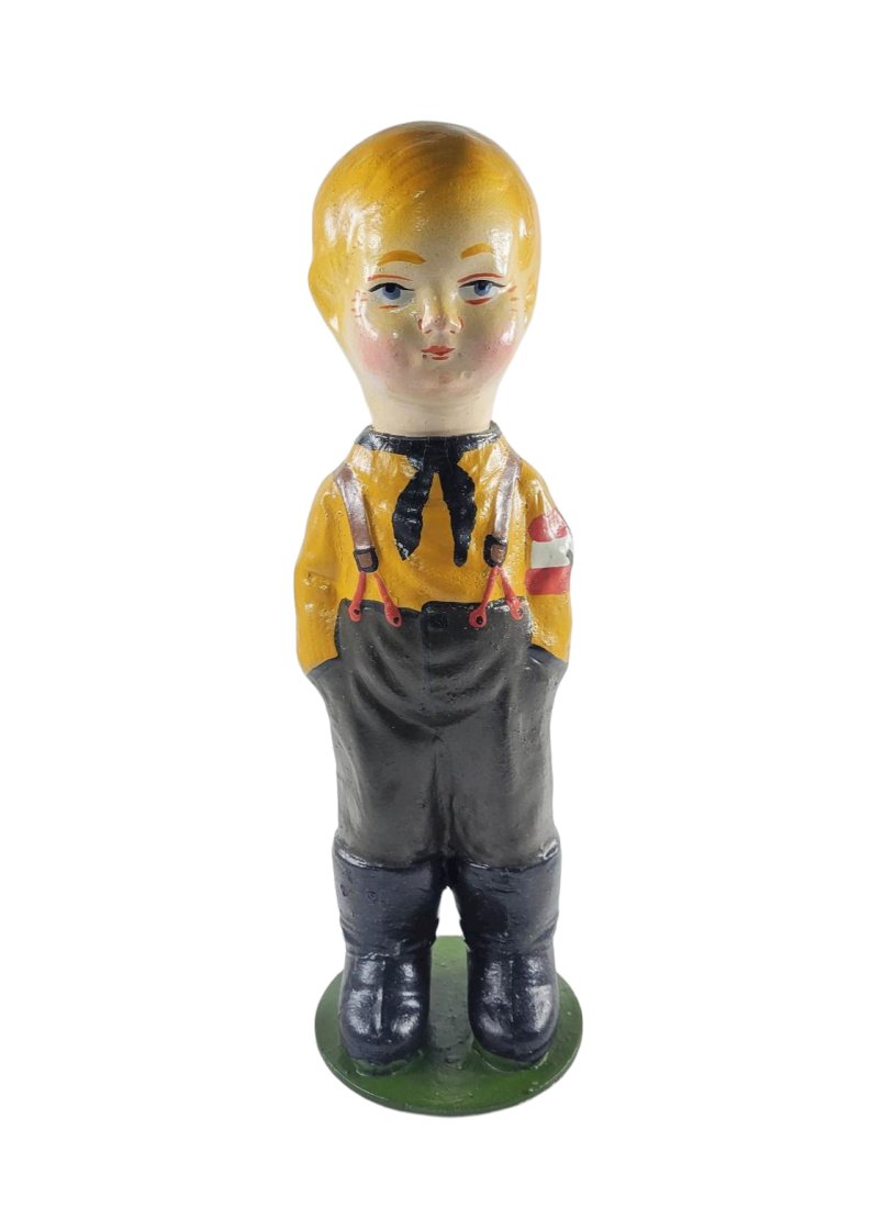 DRGM Marked Hitler Youth Pressed Paper Candy Holder: This period, pressed paper candy holder is in mint condition.Measuring 9.75 inches tall it is of a Hitler Youth boy, in his outfit with an armband on.His head comes off and on the back of him, you can