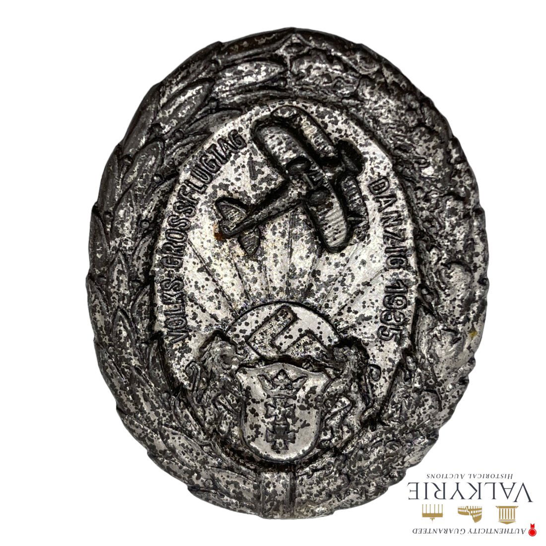 Nazi Rare German Badge "Volks Grosse Flugtag Danzig 1935: Nazi Rare German Badge "Volks Grosse Flugtag Danzig 1935 "Was horizontal hook but is missing, stamped light withe metal with swastika , unmarked, good condition just some rust.Very interesting design,