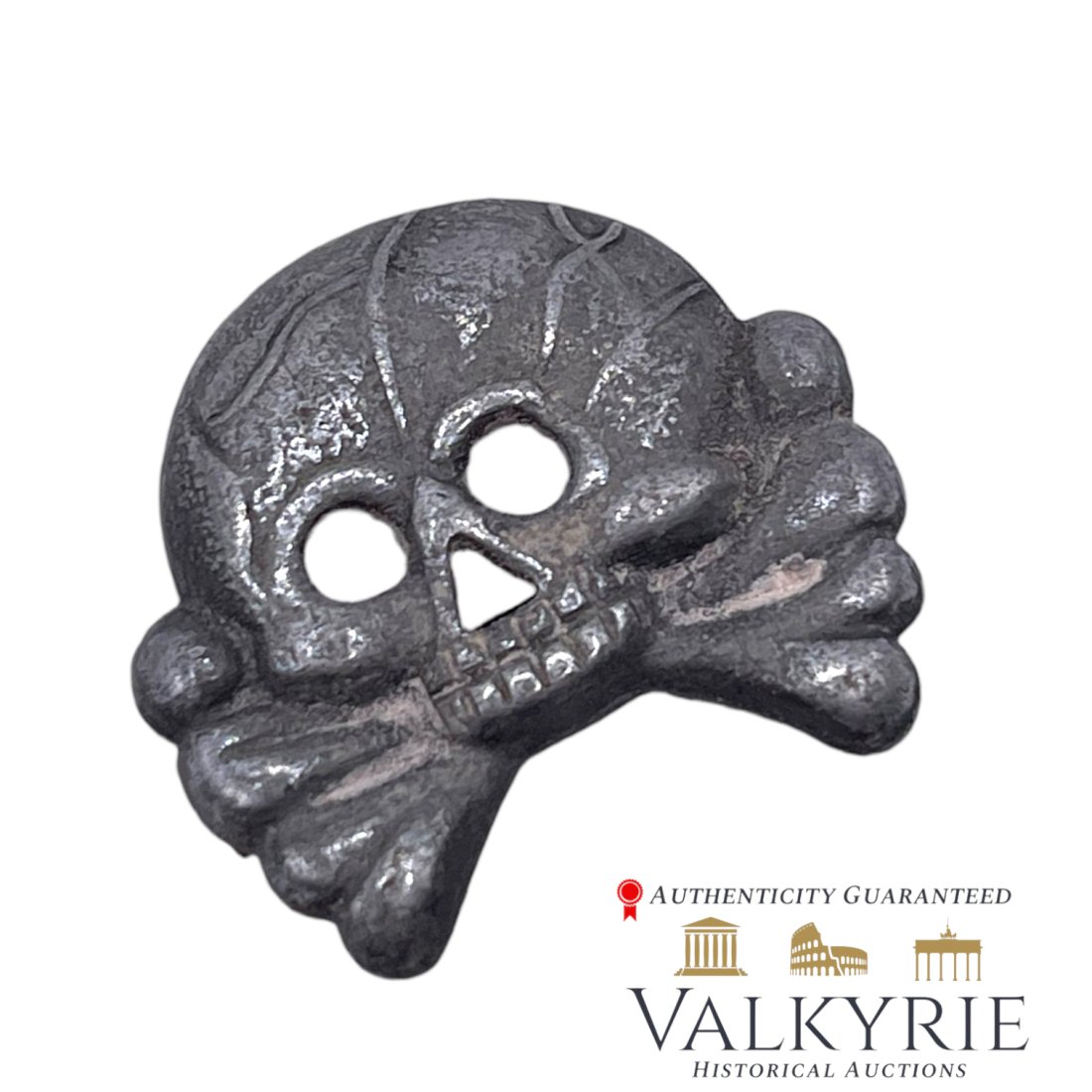 German WWII Nazi Panzer Skull Collar Tab: German WWII Nazi Panzer Skull Collar Tab, one prong missing.