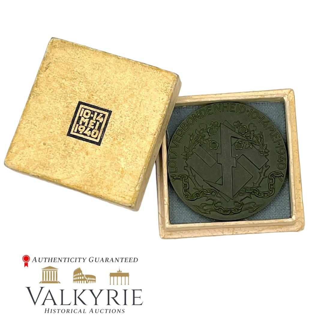 Boxed Dutch National Socialist NSB Medal: Boxed Dutch National Socialist NSB Medal. This medal was given by the NSB to NSB members and German citizens interned by the Dutch government during the German invasion in May of 1940.