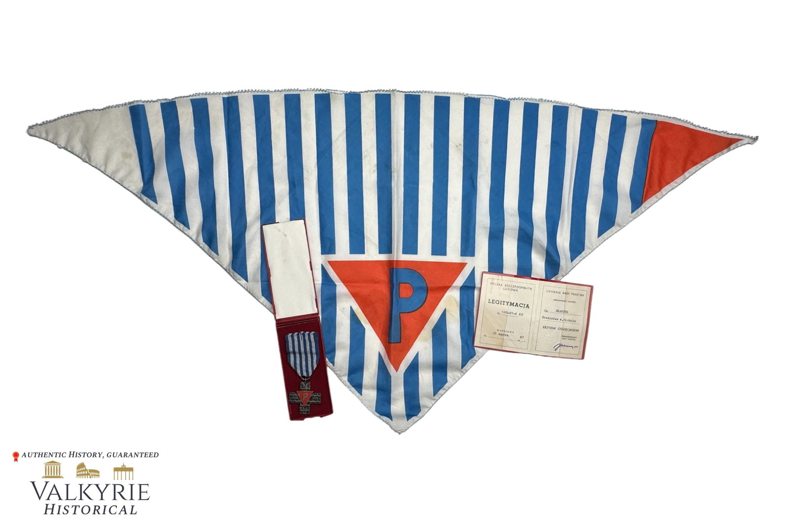 Post-war Set of Items Belonging to a Former Polish Concentration Camp Inmate: Post-war Set of Items Belonging to a Former Polish Concentration Camp Inmate. Set includes the Auschwitz Cross in its box of issue as well as the certificate issued in 1987. Also a commemorative handk