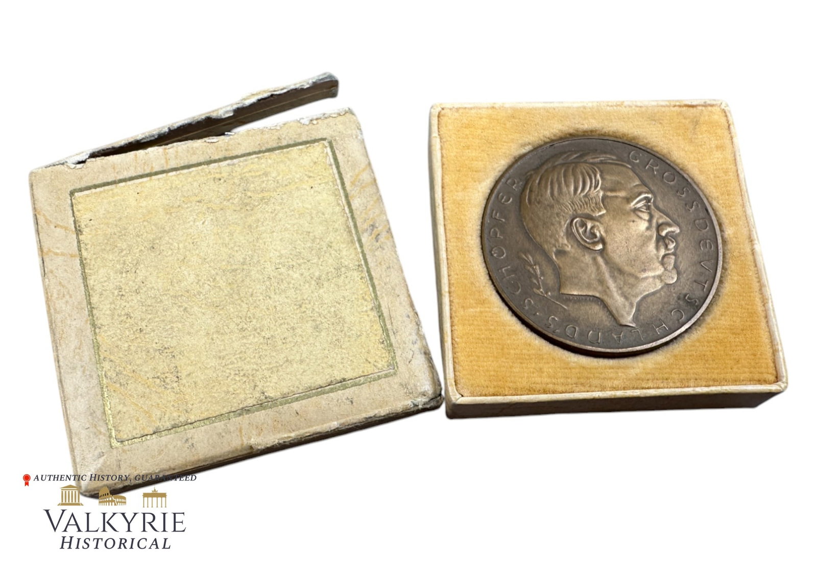 Boxed III Reich Period Medaillion Commemorating the Anschluss or Annexation of Austria to the Reich: Boxed III Reich Period Medaillion Commemorating the Anschluss or Annexation of Austria to the Reich. With the bust of Adolf Hitler as "Creator of the Great Germany". And also the motto "Ostmark is bac