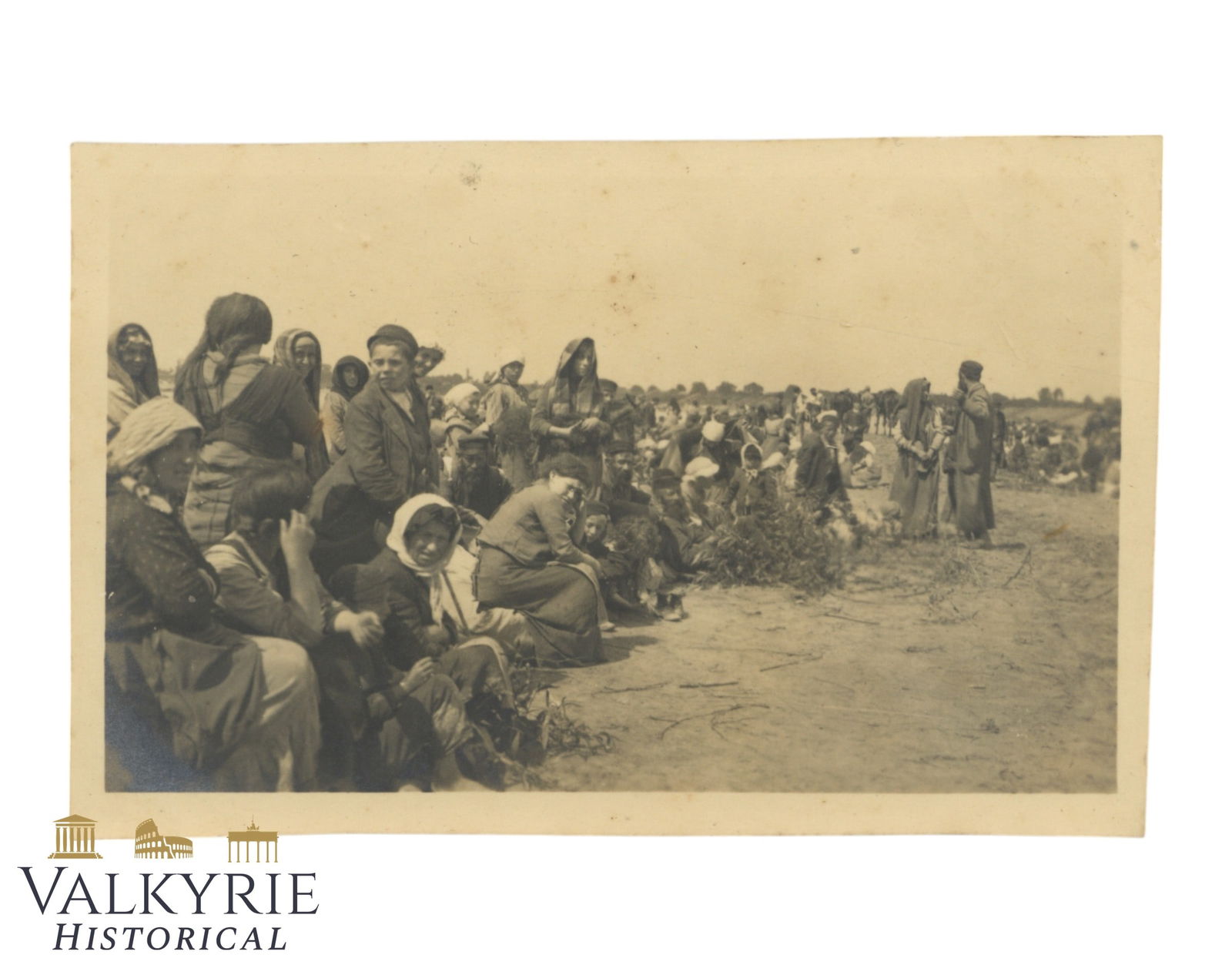 III Reich Period Photo Showing a Big Group of Eastern Gypsies Awaiting a Decision by Germans: III Reich Period Photo Showing a Big Group of Eastern Gypsies Awaiting a Decision by Germans. Described on the reverse. Size: 14x9cm All items for this auction will be shipping from Europe. Shipping c