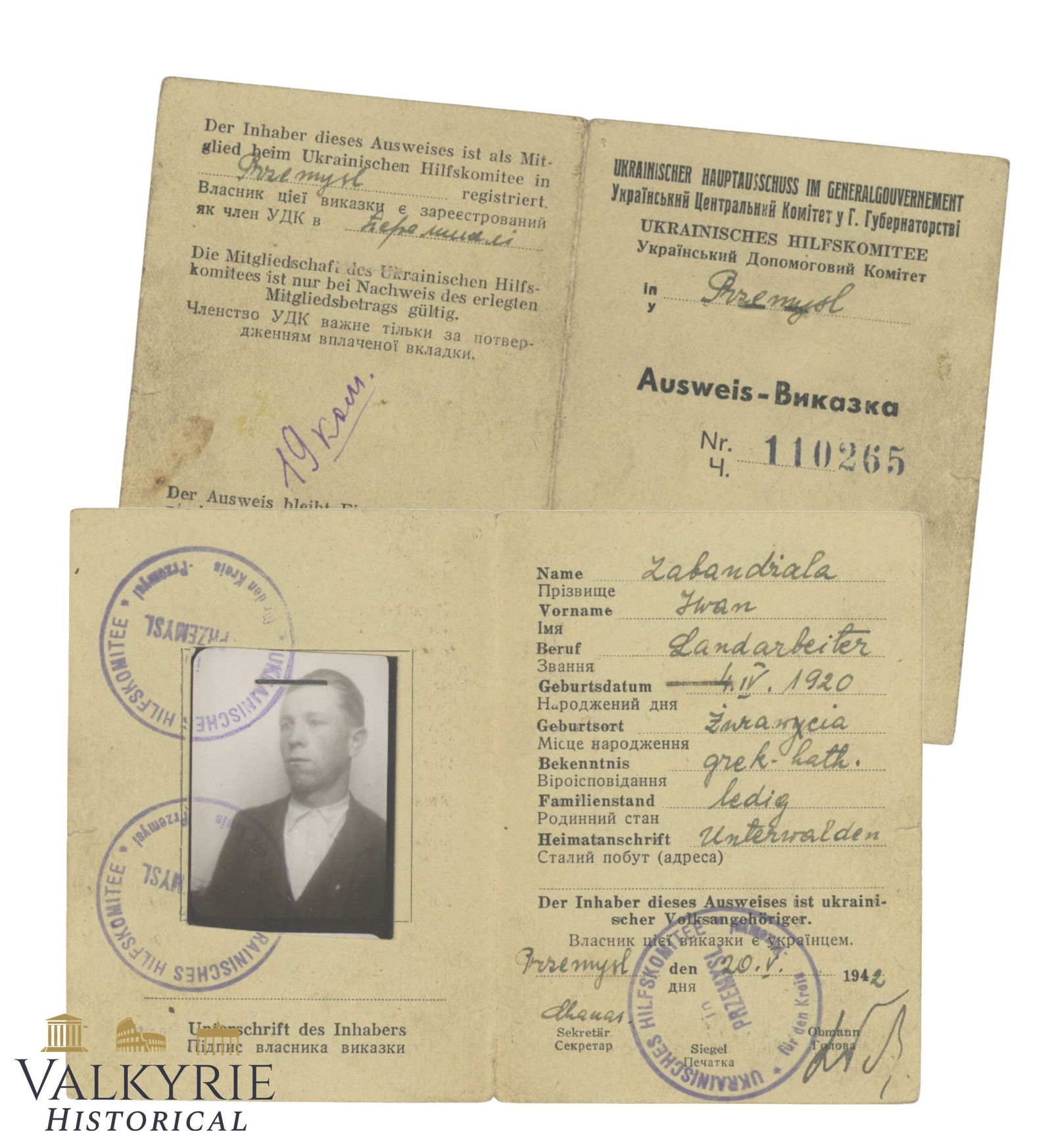 Ausweis Issued in 1942 by Ukrainian Relief Committee in the Generalgouvernement to a Refugee: Ausweis Issued in 1942 by Ukrainian Relief Committee in the Generalgouvernement to a Refugee. With photo of the man who was a farmer. It is printed in German, Ukrainian and Russian. All items for this