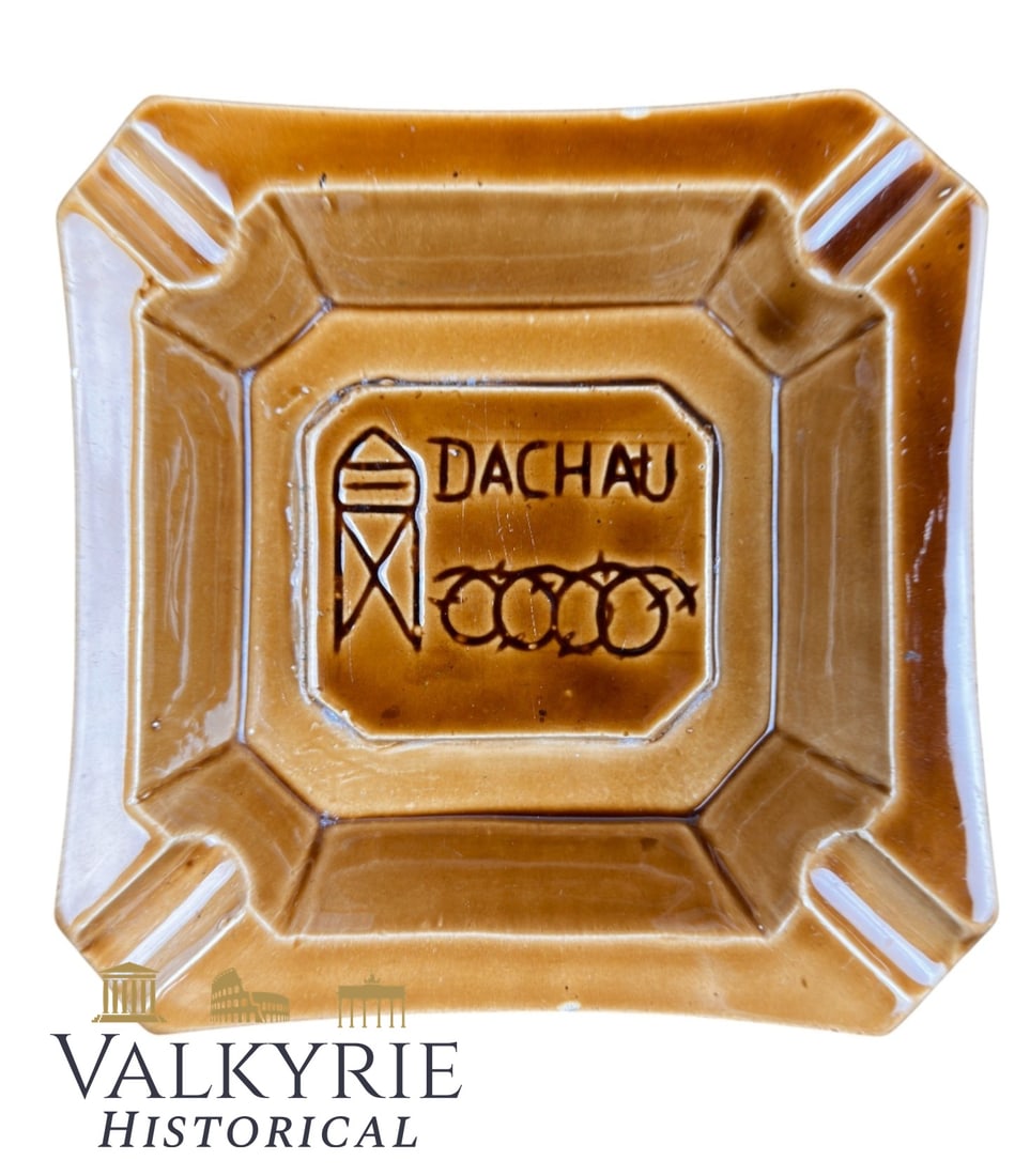 Ashtray Dachau concentration camp: Dachau Ashtray Post-war Dachau commemorative ashtray Glazed ceramic ashtray in an amber/brown finish, made in the post-war period (after 1945). Square, stepped form with four cigarette rests. The cent