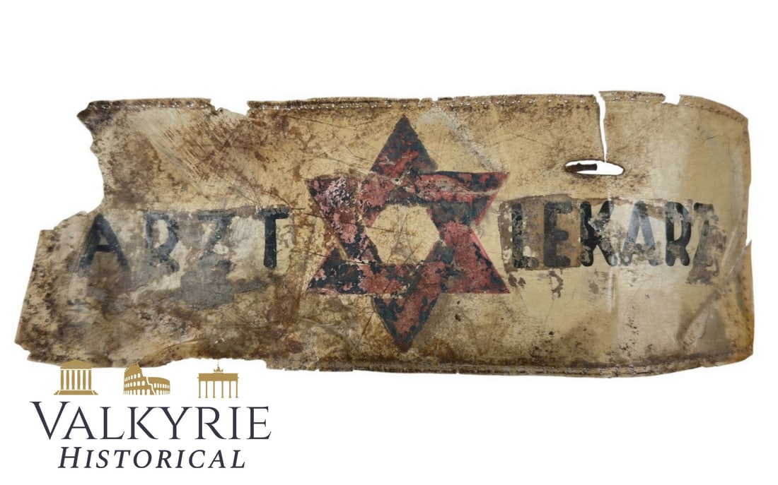 Ultra Rare Armband or Sign Used by Jewish Doctor in a Warsaw Ghetto in Poland: Ultra Rare Armband or Sign Used by Jewish Doctor in a Warsaw Ghetto in Poland. It is made from kind of plastic and painted on it the word "ARZT" in German for Doctor and "LEKARZ" in Polish for Doctor