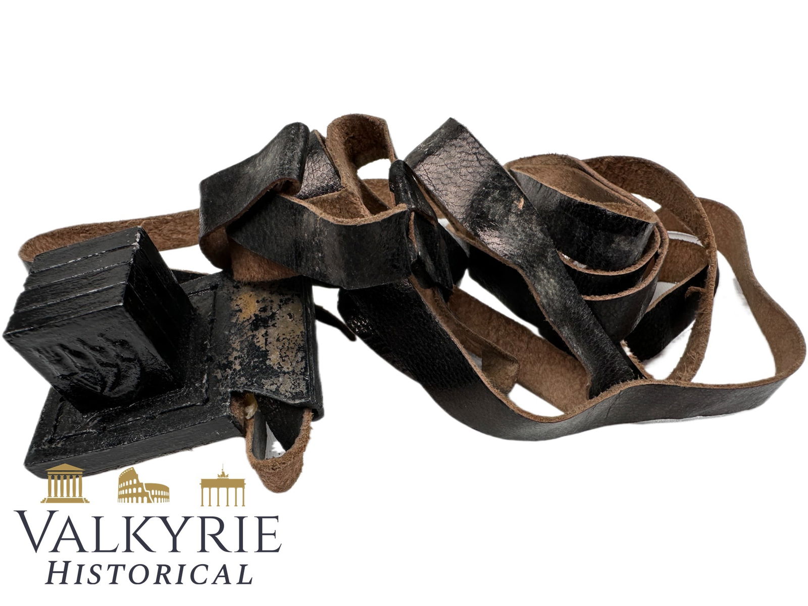 Old Jewish Tefillin Found in Poland after rabbi Zew Wawa Morejno.: Old Jewish Tefillin Found in Poland after rabbi Zew Wawa Morejno. Tefillin , or phylacteries, are a set of small black leather boxes with leather straps containing scrolls of parchment inscribed with