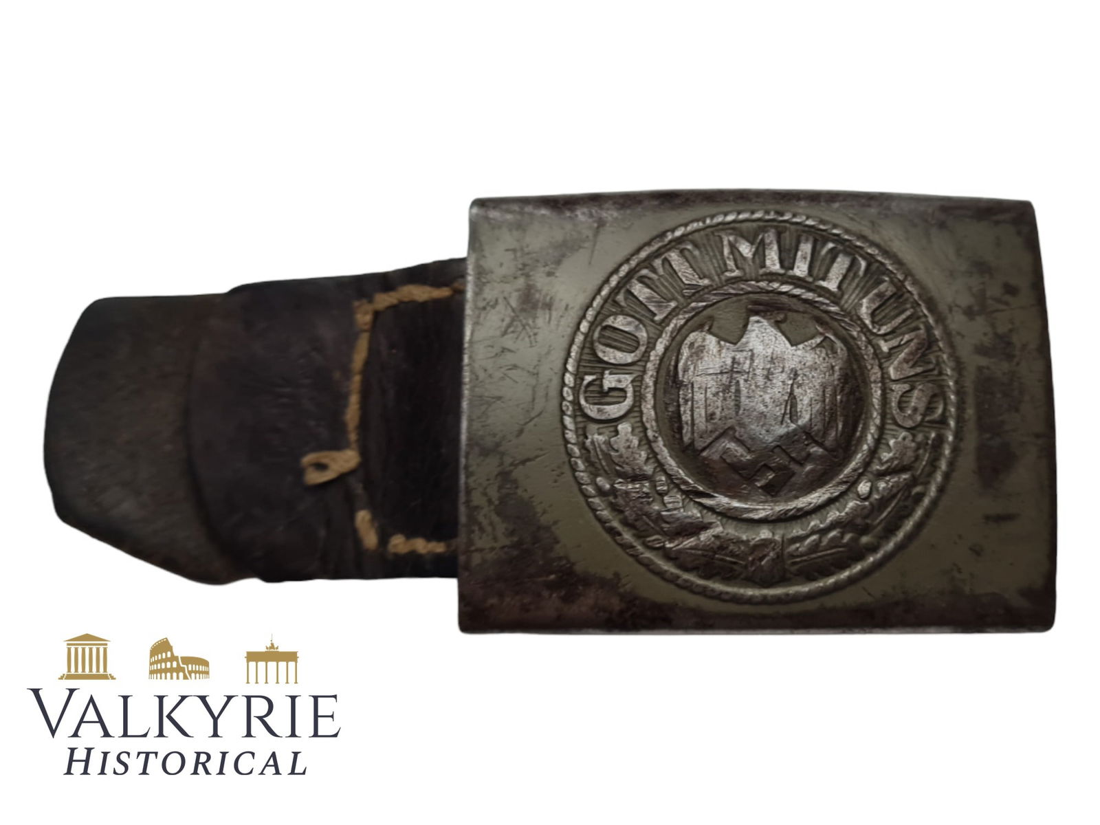 German Steel Heer Buckle (WH) Wehrmacht with leather tongue: Nice Wehrmacht steel buckle with leather tongue. With almost 70% of the original Feldgrau paint remaining and with heavy use in battle. Due to use eagle and swastika are a bit erased and filed, but th