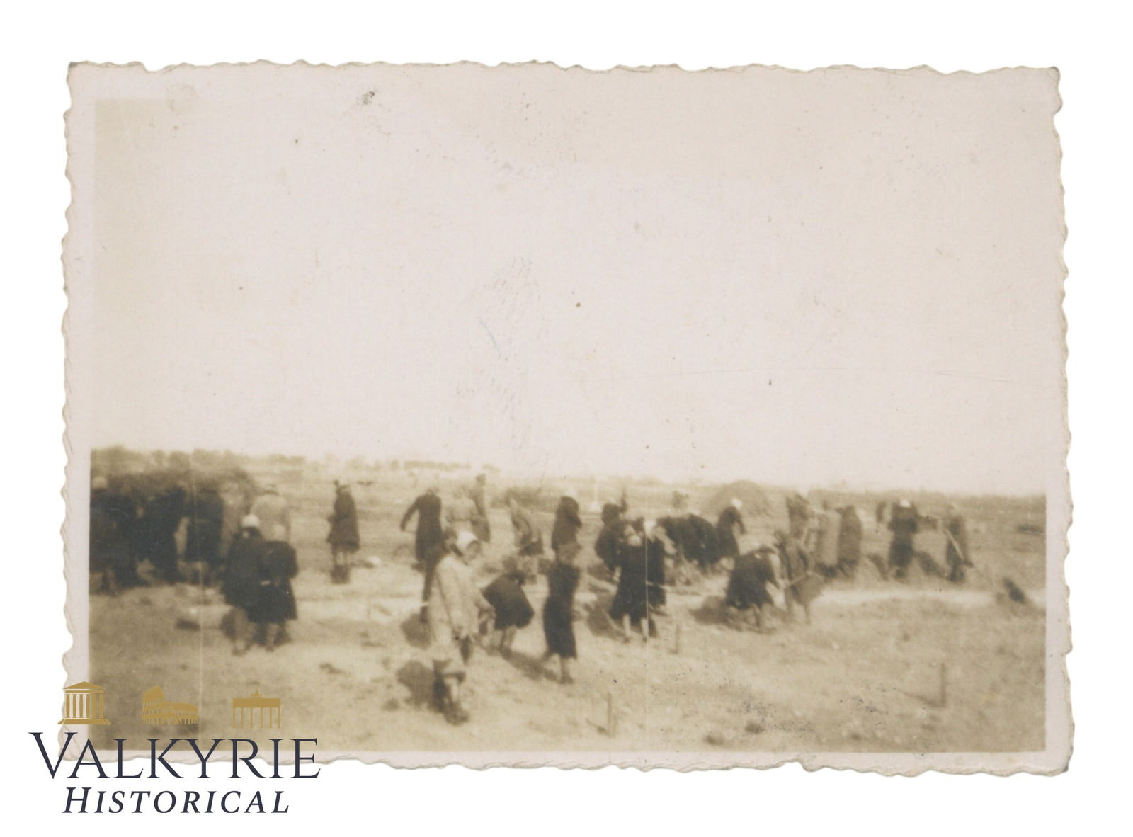 Photo of Jewish Women Workers With Stars on their Backs: Photo taken during Nazi occupation of Poland where we can see some Jewish women gathered most probably for slave labor. Some of the Jews are wearing the star of David patches on their backs! Photo tak