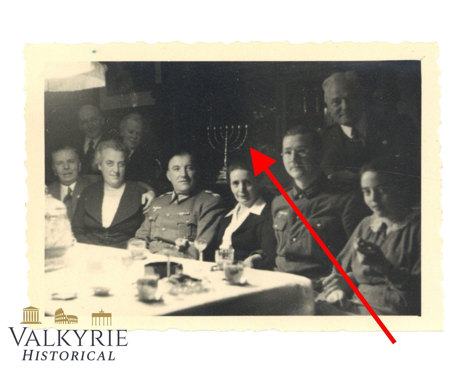 Very Rare Photo Taken in 1940 of 2 Wehrmacht Members Having Dinner With Jewish Menorah Behind: Very Rare Photo Taken in 1940 of 2 Wehrmacht Members Having Dinner With Jewish Menorah Behind. If we speculate about this photo we can think these are Wehrmacht soldiers invited to a Jewish home who w