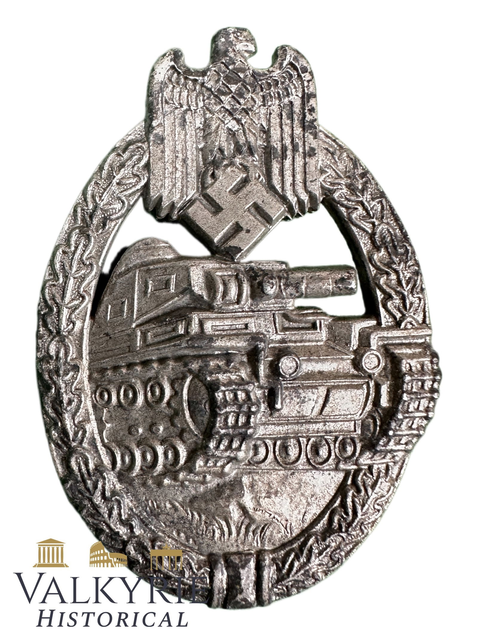 Panzer Assault Badge Silver - Producer RRS Rudolf Richter Schlag: Panzer Assault Badge Silver, semi-hollow construction in zink, marked RRS, producer RRS Rudolf Richter Schlag. The reverse is complete with vertical barrel hinge, with round wire catch nice patina. Al