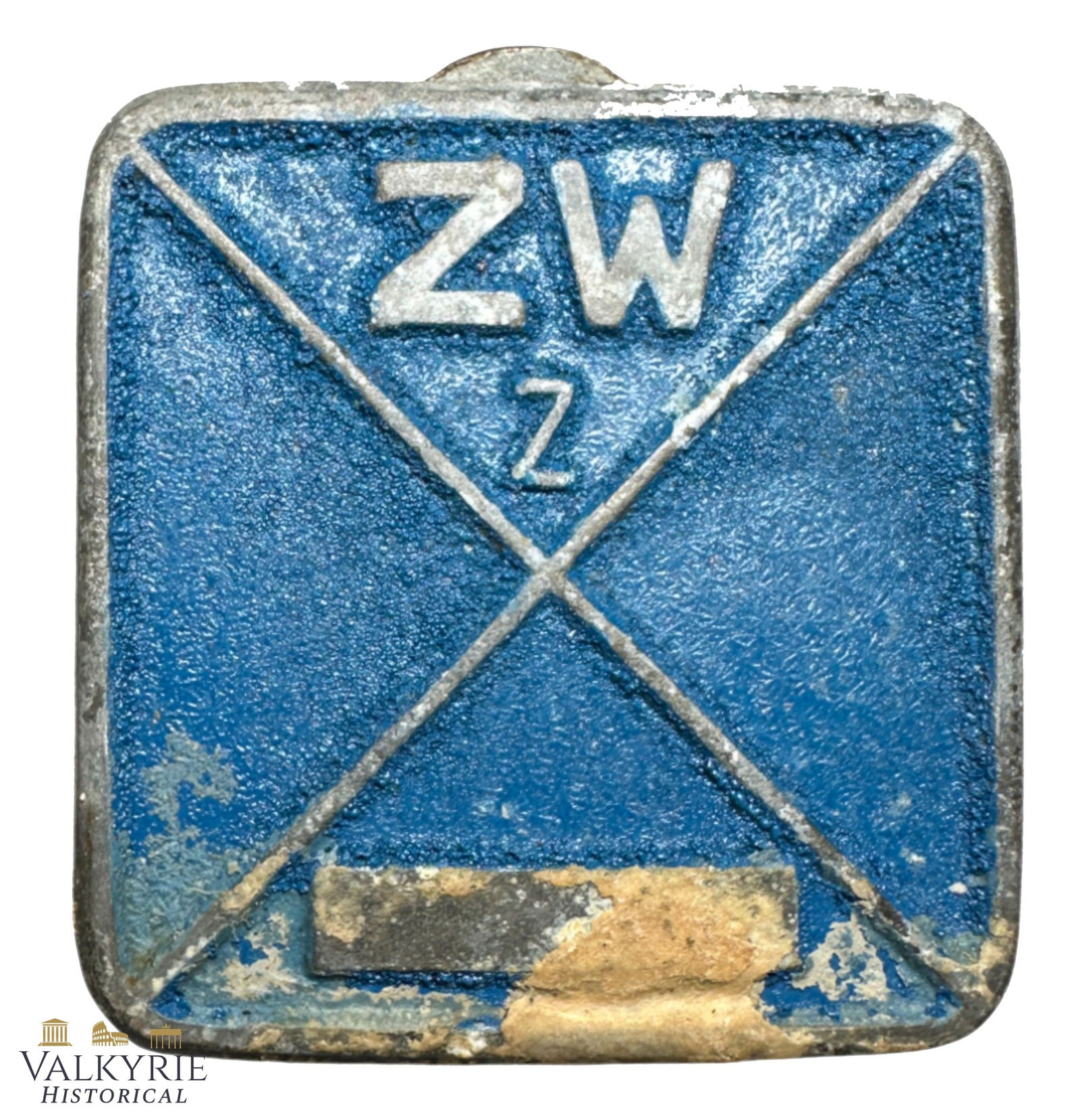 Relic Condition Ground Dug German Labour Camp Tag For Slave Labourers From Factory in Zittau: Relic Condition Ground Dug German Labour Camp Tag For Slave Labourers. ZW stands for "Zwangsarbeiter" which means Slave labourer. These tags were used in the buttonhole and they had different colours
