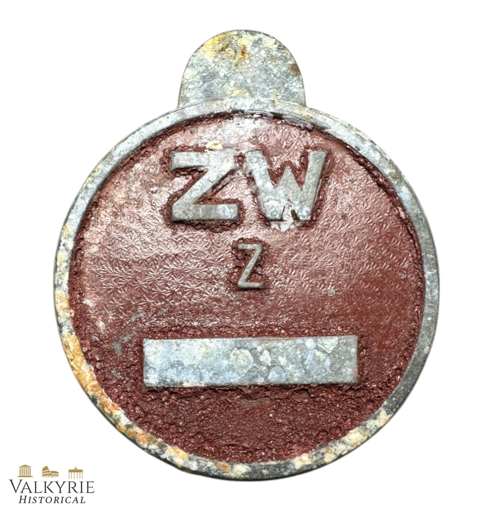Relic Condition Ground Dug German Labour Camp Tag For Slave Labourers From Factory in Zittau: Relic Condition Ground Dug German Labour Camp Tag For Slave Labourers. ZW stands for "Zwangsarbeiter" which means Slave labourer. These tags were used in the buttonhole and they had different colours