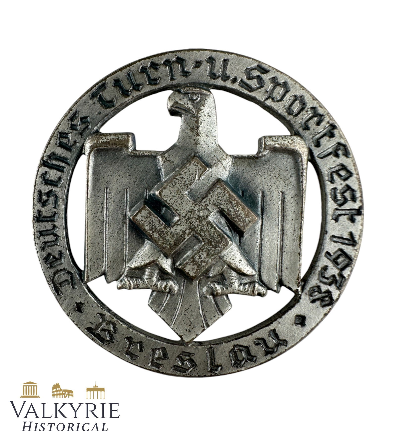 Commemorative Badge of the NSRL German Gymnastics and Sports Festival in Breslau 1938: Commemorative Badge of the NSRL German Gymnastics and Sports Festival in Breslau 1938. With needle system working perfectly and maker mark on the reverse. All items for this auction will be shipping f