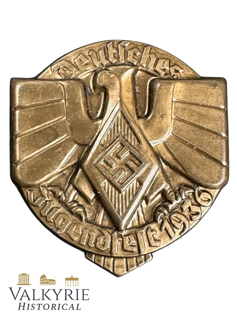 Nazi Commemorative Badge of the Hitlerjugend German Jugendfest 1936: German Commemorative Metal Medallion of the 1936 Berlin Olympic Games. Complete with needle system. All items for this auction will be shipping from Europe. Shipping cost $25 it doesn't matter how man