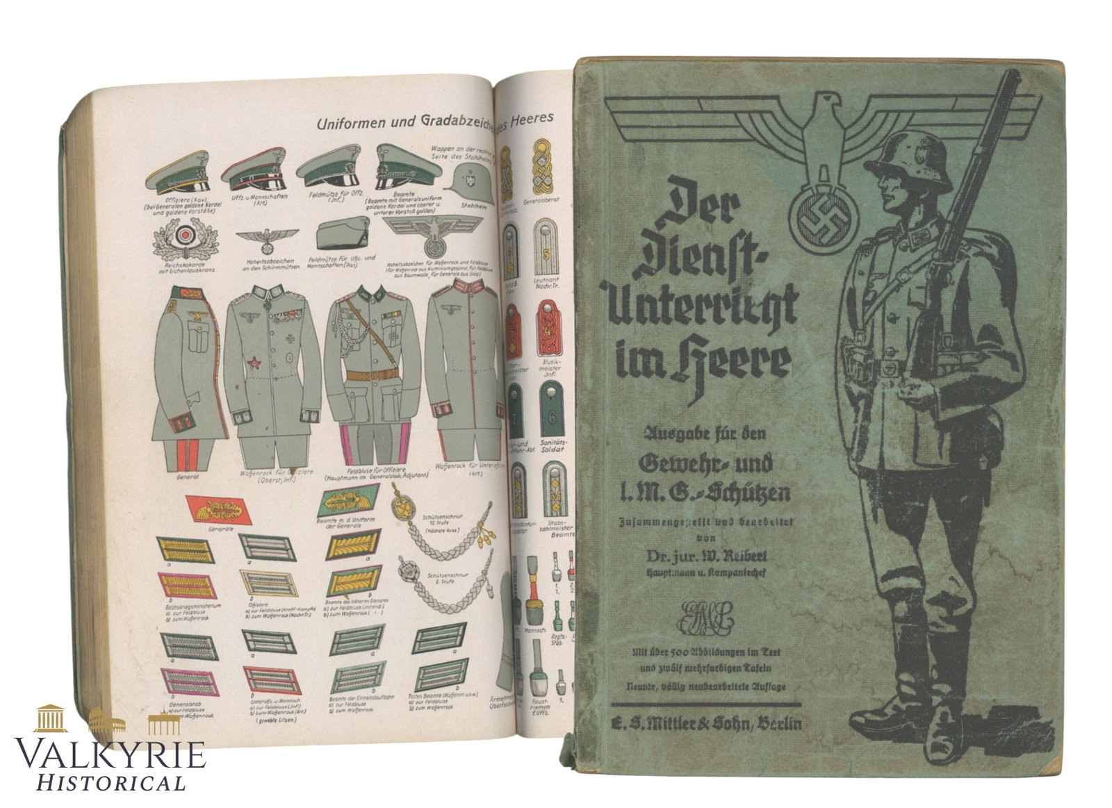 German Military Handbook "The Service Training in the Army. Ed. For Privates" by Dr. Jur. W. Reibert: German Military Handbook "The Service Training in the Army. Ed. For Rifle and 1. Machinegun Privates" by Dr. Jur. W. Reibert. Year 1937. Soft cover. Full of coloured sheets with uniforms, ranks, insig
