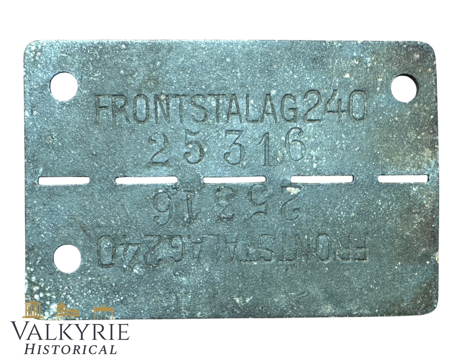 Relic Condition Ground Dug ID Tag of a Prisoner of War in German Front Stalag 240 - Verdun: Relic Condition Ground Dug ID Tag of a Prisoner of War in German Front Stalag 240. Made from zinc. Frontstalag 240 was a German military internment and transit camp located on the outskirts of Verdun,
