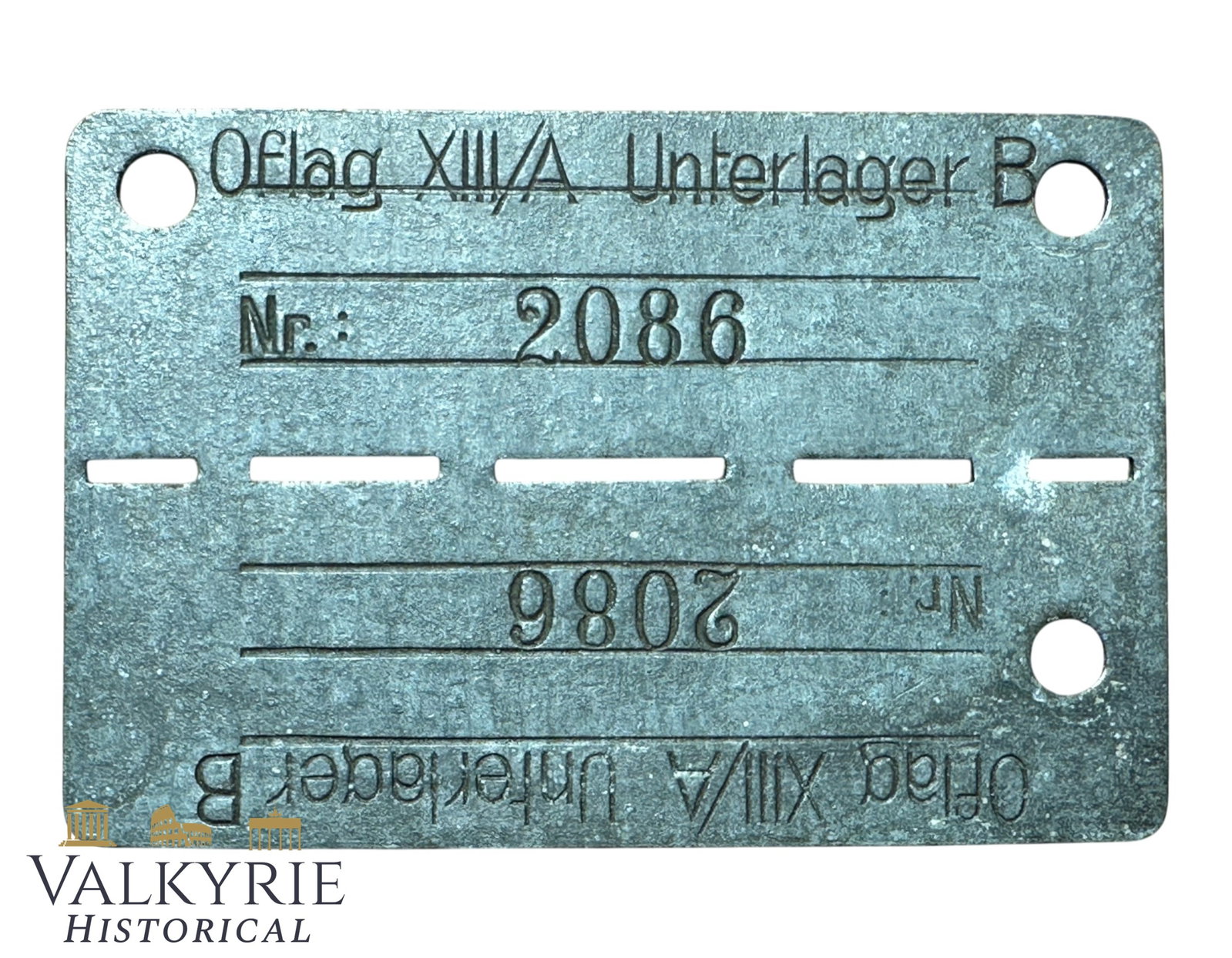 Relic Condition Ground Dug ID Tag of a Prisoner of War in German Officers' Lager XIII/A Unterlager B: Relic Condition Ground Dug ID Tag of a Prisoner of War in German Officers' Lager XIII/A Unterlager B. Made from zinc. Oflag XIII-A Unterlager B was a World War II German prisoner-of-war subcamp for Al