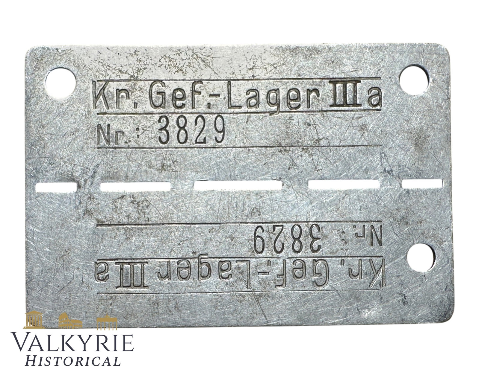 Relic Condition Ground Dug ID Tag of a Prisoner of War in German POW Camp III A- Luckenwalde: Relic Condition Ground Dug ID Tag of a Prisoner of War in German POW Camp III A. Made from aluminum. Stalag III-A was a major German WWII POW camp located in Luckenwalde, Brandenburg, about 52 km (32 