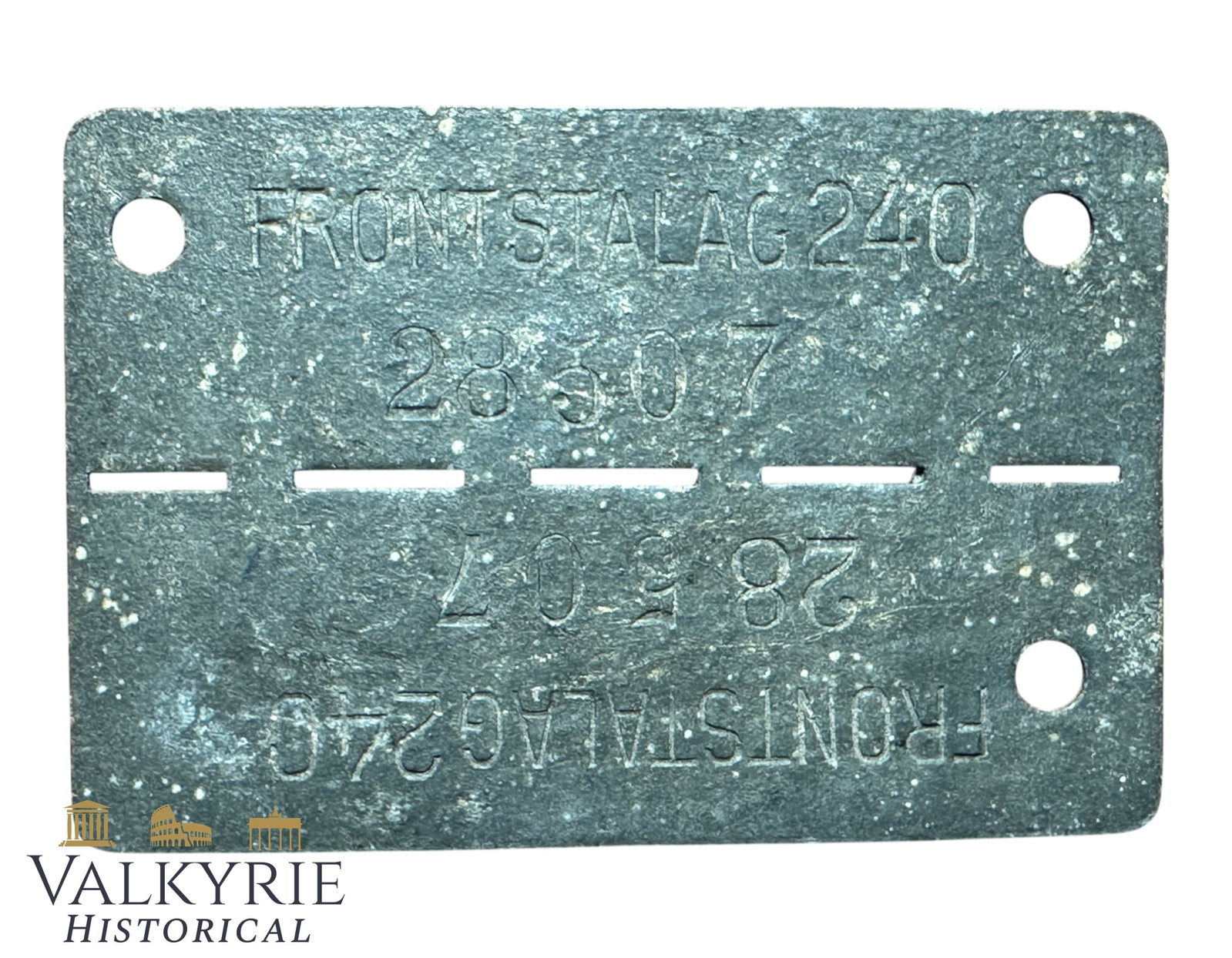 Relic Condition Ground Dug ID Tag of a Prisoner of War in German Front Stalag 240 - Verdun: Relic Condition Ground Dug ID Tag of a Prisoner of War in German Front Stalag 240. Made from zinc. Front Stalag 240 was a World War II German prisoner-of-war transit camp located on the outskirts of V