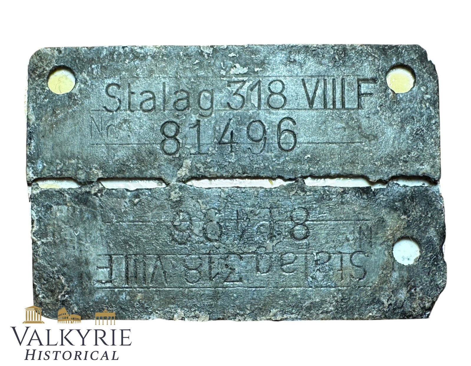 Relic Condition Ground Dug ID Tag of a Prisoner of War in German Stalag 318 VIII F - Lamsdorf: Relic Condition Ground Dug ID Tag of a Prisoner of War in German Stalag 318 VIII F. Clipped so mounted on a rigid base to keep it together both pieces. Stalag VIII-F was a German prisoner-of-war camp 