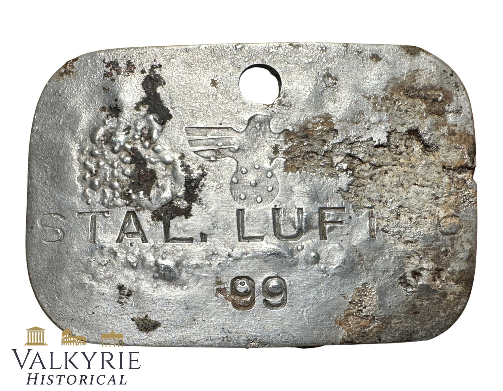Relic Condition Ground Dug ID Tag of a Prisoner of War in German Luftwaffe Stalag 6 - Heydekrug: Relic Condition Ground Dug ID Tag of a Prisoner of War in German Luftwaffe Stalag 6. With eagle without swastika. Stalag Luft 6 was a German Luftwaffe prisoner-of-war camp for captured Allied airmen. 