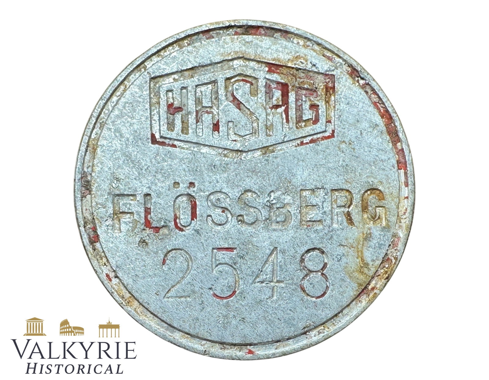 German Arms Manufacturing Company HASAG Metal ID Tag For Factory in Floessberg - Relic Condition: German Arms Manufacturing Company HASAG Metal ID Tag For Factory in Floessberg - Relic Condition since it's ground dug. Number 2548 on it. For workers or material? This company used slave labour from 