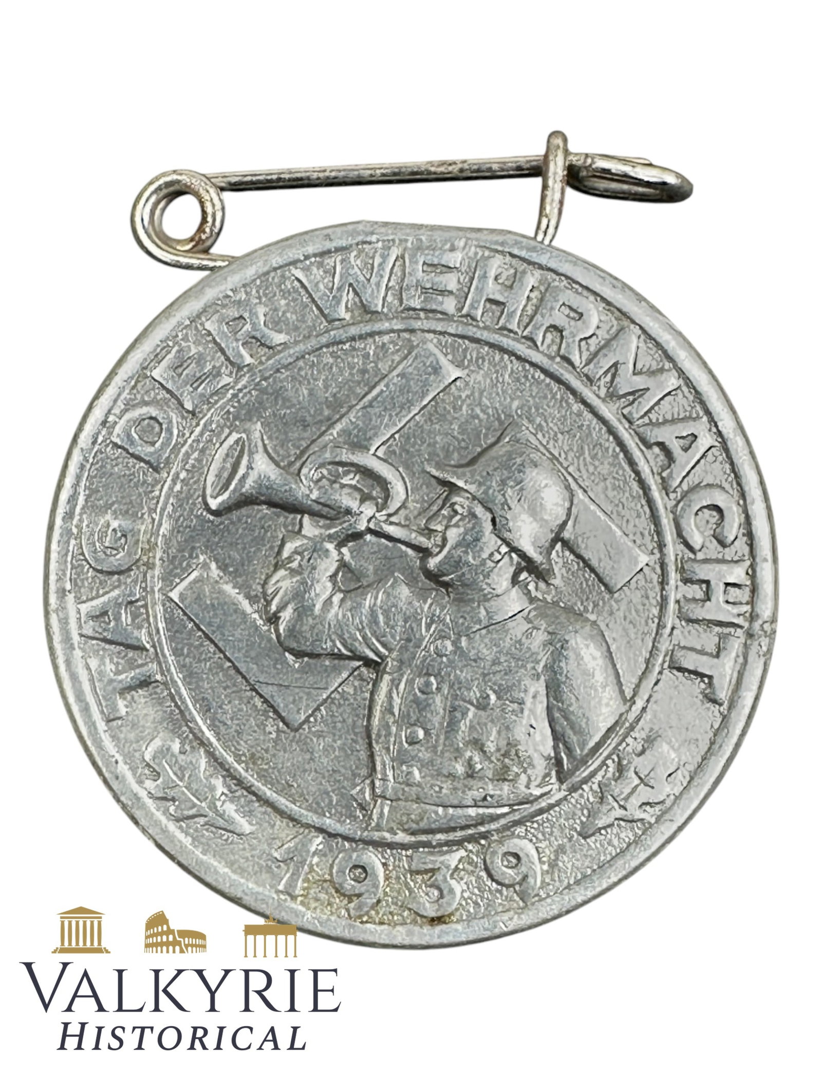 German Commemorative Metal Badge "Day of the Wehrmacht 1939": German Commemorative Metal Badge "Day of the Wehrmacht 1939". Needle system working. Shipping flat cost $25 it doesn't matter how many items you win. you pay just $25 for shipping.