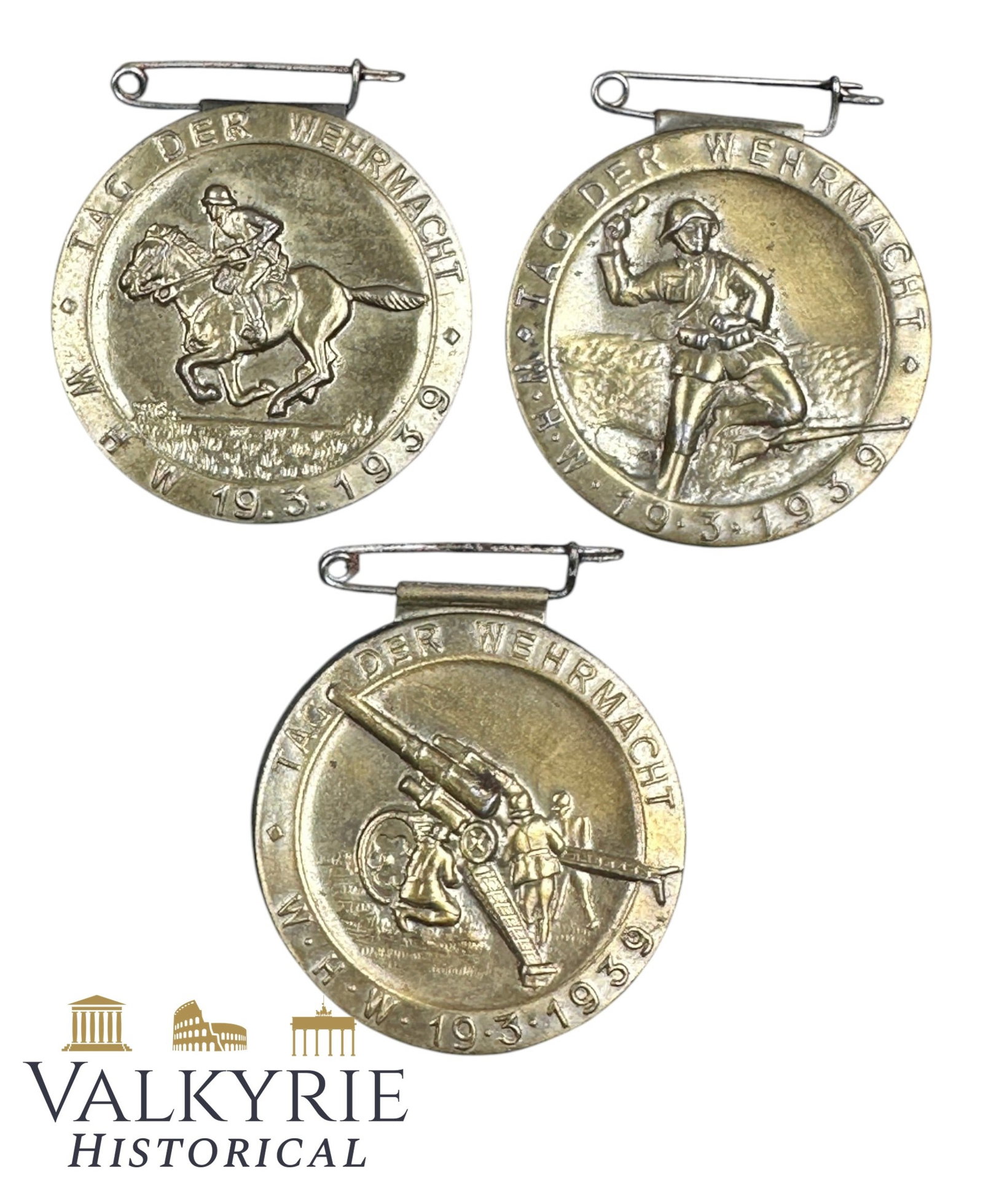 3 German Metal Badges Commemorating the WHW Campaign "Day of the Wehrmacht 1939": 3 German Metal Badges Commemorating the WHW Campaign "Day of the Wehrmacht 1939". All with different designs. All with needle systems working. Shipping flat cost $25 it doesn't matter how many items y
