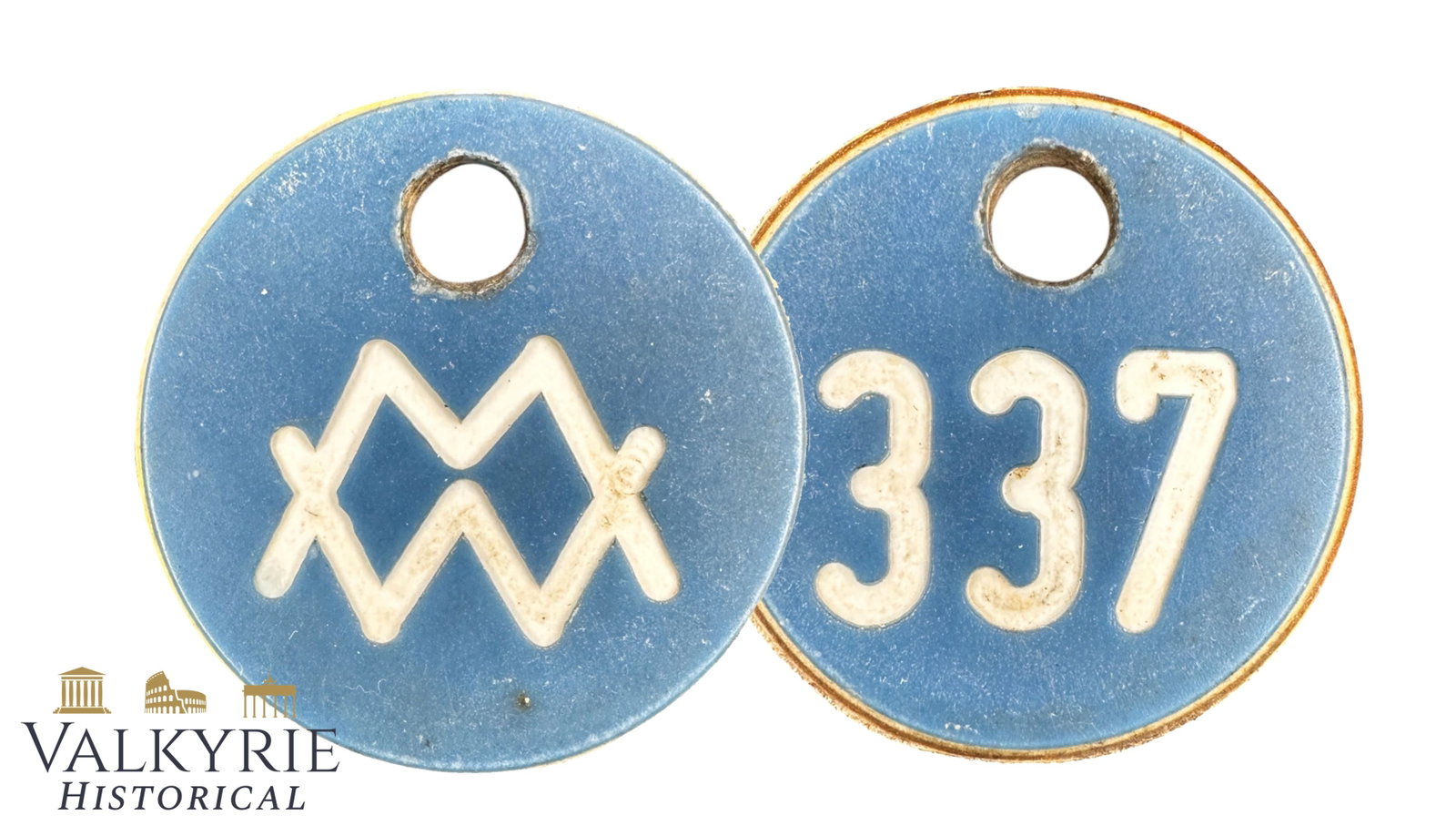 Mittelbau-Dora / Mittelwerk Tool Token (Werkzeugmarke) – No. 337 V-1 flying bombs: WWII Mittelbau-Dora Concentration Camp / Mittelwerk GmbH Tool Token (Werkzeugmarke No. 337)1. Object Description Up for auction is a rare historical artifact: an original blue Bakelite tool token (Wer
