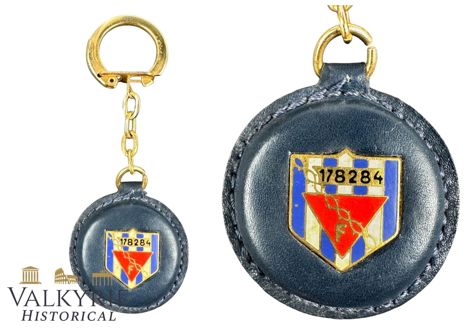 Souvenir Keychain Made For a Former French Political Prisoner in a German Concentration Camp: Souvenir Keychain Made For a Former French Political Prisoner in a German Concentration Camp. It's made from leather with an enameled shield with blue and white stripes like those of the prisoners'