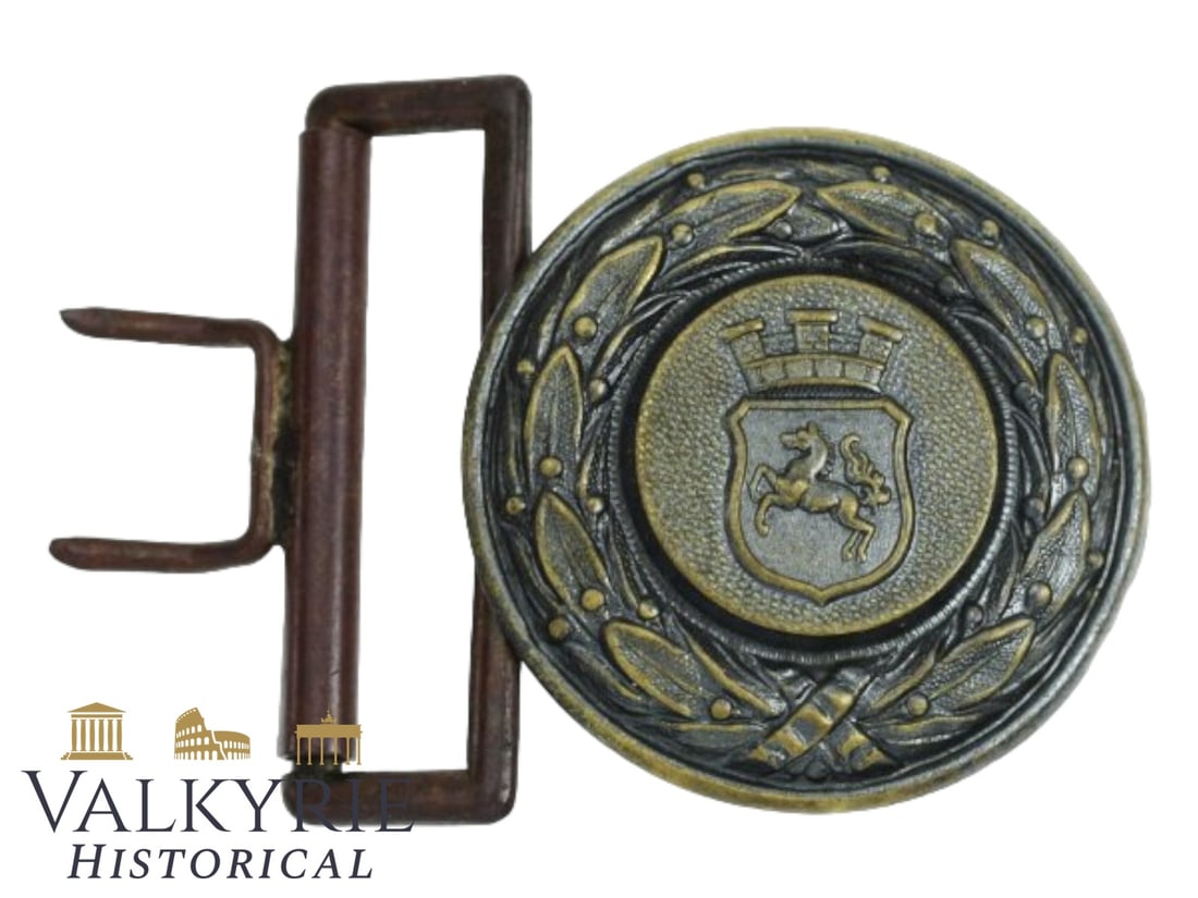 German WWII Officer Fire Brigade Buckle Province of Hannover: Officer buckle of the fire brigade of the province of Hannover. Seldom encountered 1934 pattern Feuerwehr/Feuerschutzpolizei Officer’s belt buckle. A roughly 48 mm diameter, die struck brass constru