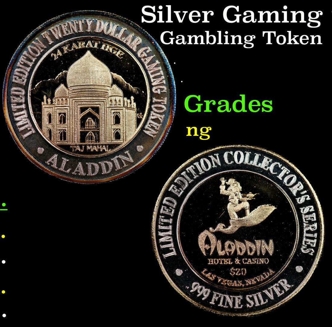Silver Gaming token with 24K heavy gold electroplate $20 Aladdin Hotel & Casino Las Vegas, NV Grades (1 of 3)