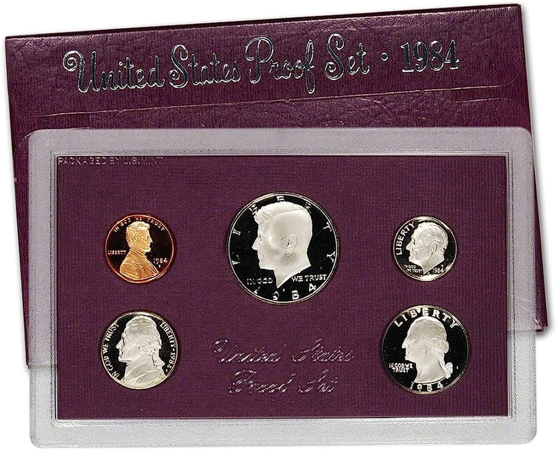 1984 Mint Proof Set, 5 Coins Inside!: 1984 Mint Proof Set, 5 Coins Inside! . Original packaging: The coins of the 1984-S Proof Set were placed in individual holes in a purple-colored, textured paper and cardboard insert, then sealed in a 