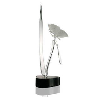 Frabel (German, 1941-) "Butterfly on Foliage" Glass: Opaque glass butterfly perched on clear glass foliage. Black lacquered kidney shaped base. Measures 15.25" x 7" x 16".